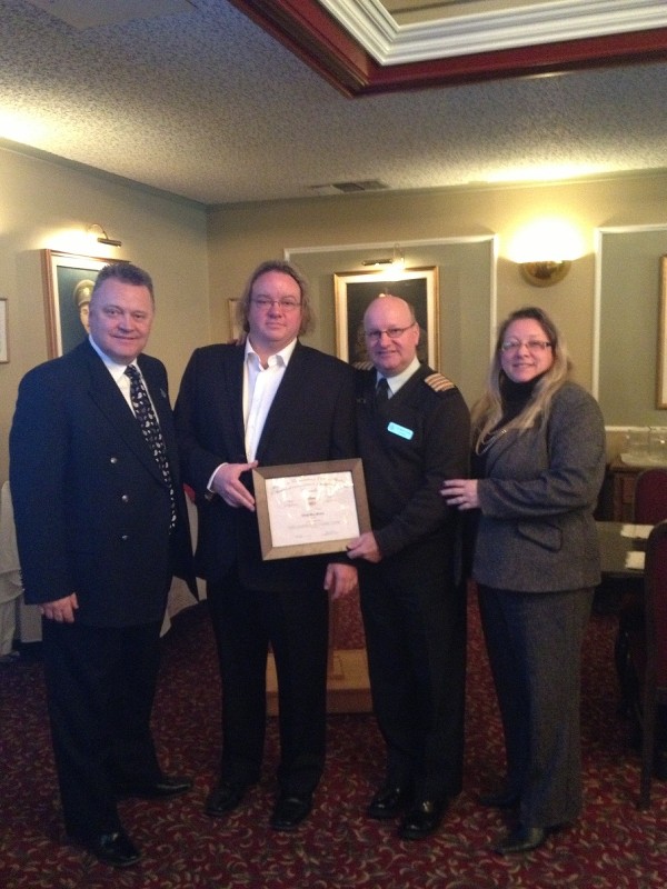 Joining together at the April luncheon are (l-r) Tim Kline of NIKSUN, the luncheon sponsor; Chris Mac-Stoker, distinguished engineer and ED, product management, NIKSUN; Col. Martin Girard, chapter president; and Kelly Stewart-Belisle, regional vice president.